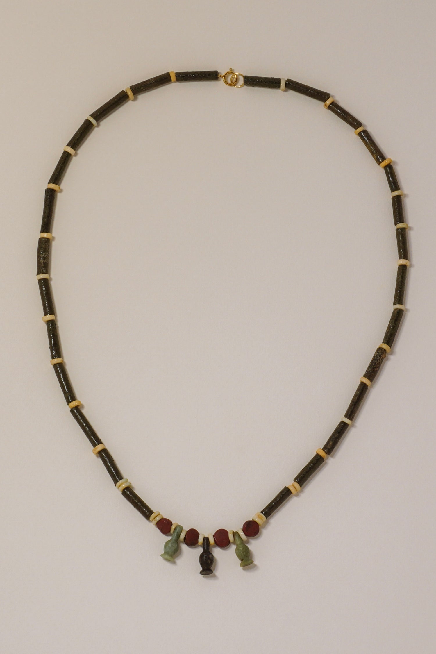 ANCIENT EGYPTIAN NECKLACE WITH FAIENCE, LAPIS LAZULI, TURQUOISE AND RED JASPER BEADS. 1550-1070 BC